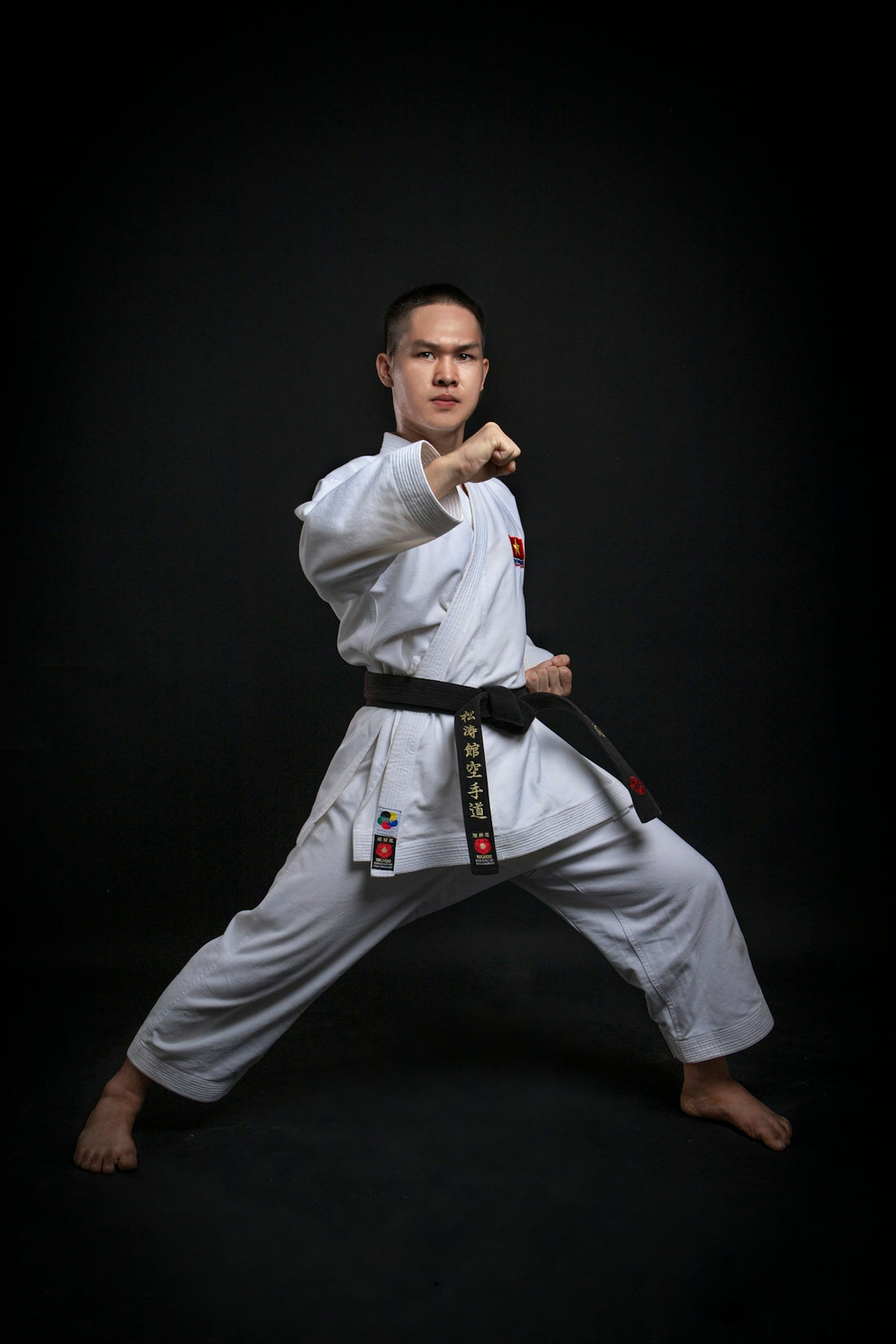 a man in a karate uniform